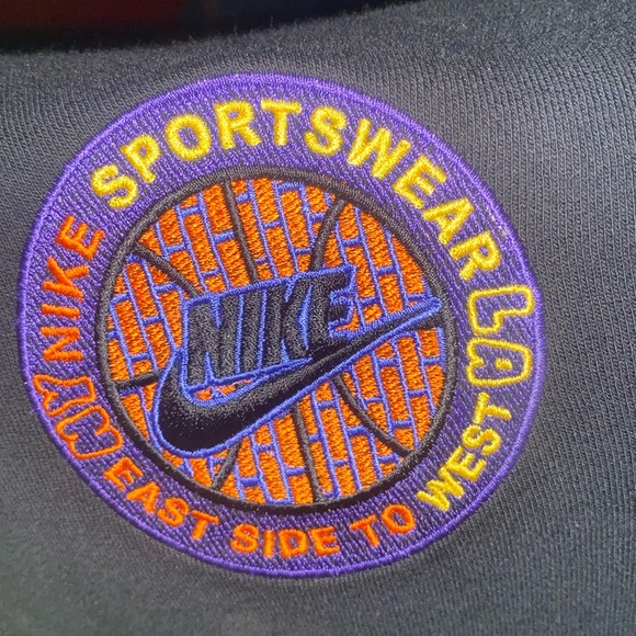 A zip up jacket purple,yellow,orange,blue, and black - Picture 5 of 5